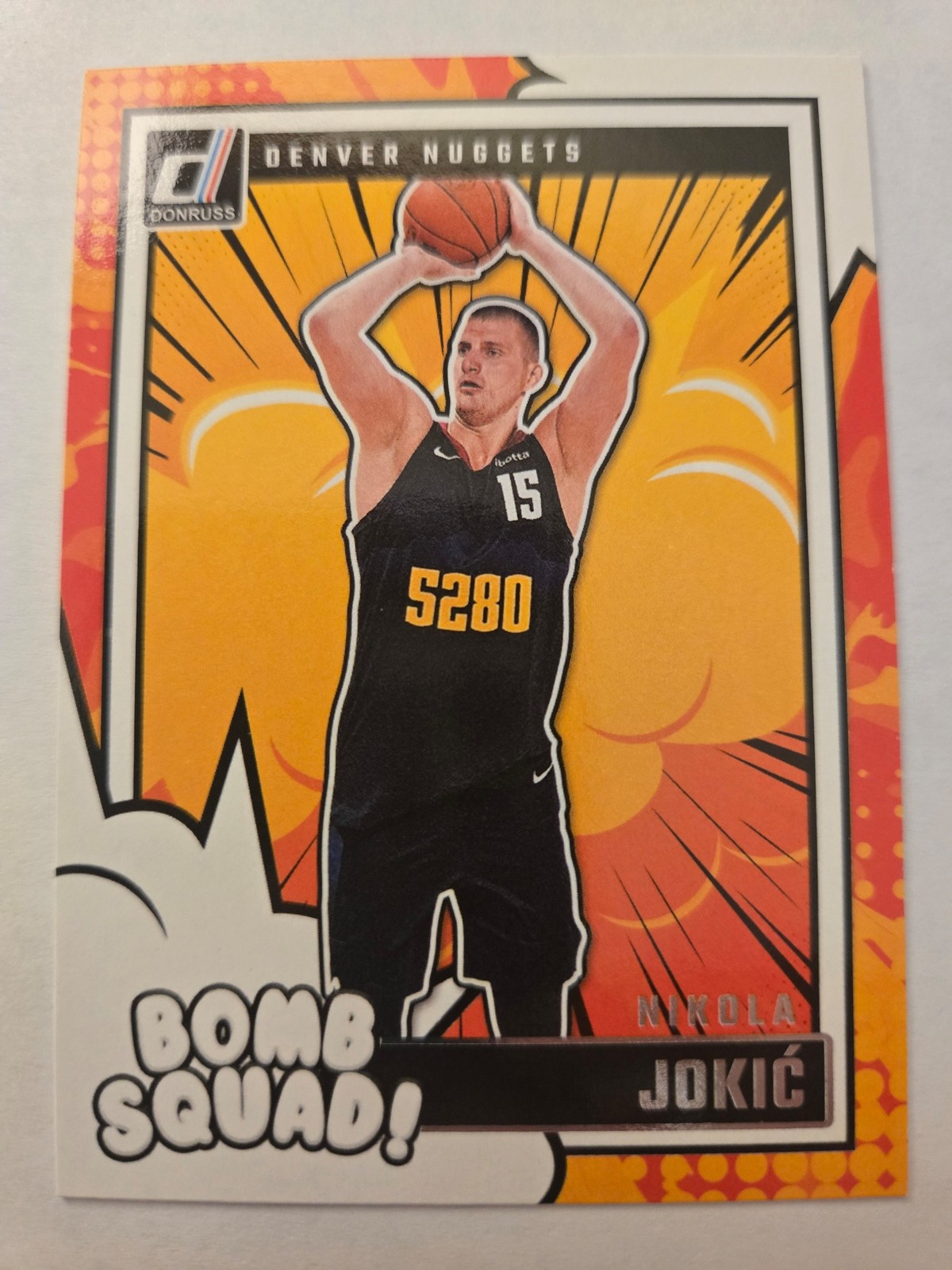 Nikola Jokic #2 Basketball Cards 2024 Panini Donruss Bomb Squad trading card — raw and PSA graded price guide