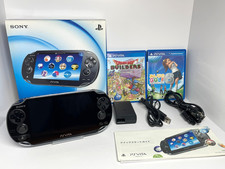 Sony PS Vita PCH-1100 AB01 OLED Black Boxed w/ Charger 8GB Card  2 Games
