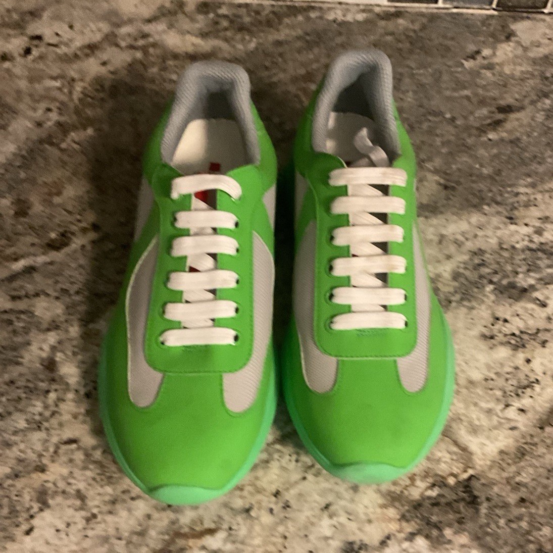 PRADA Men's Green White Gray Athletic Sneakers with Red Heel Accent