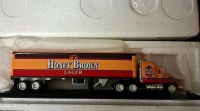 1:100 Scale Matchbox CCY05-M MACK CH600 Truck & Trailer - Honey Brown Lager