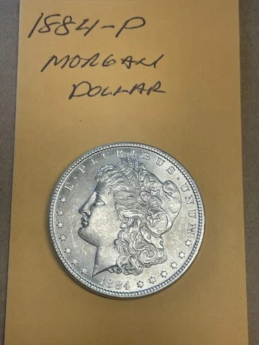 AU circulated 1884-PMint Silver Morgan Dollar
