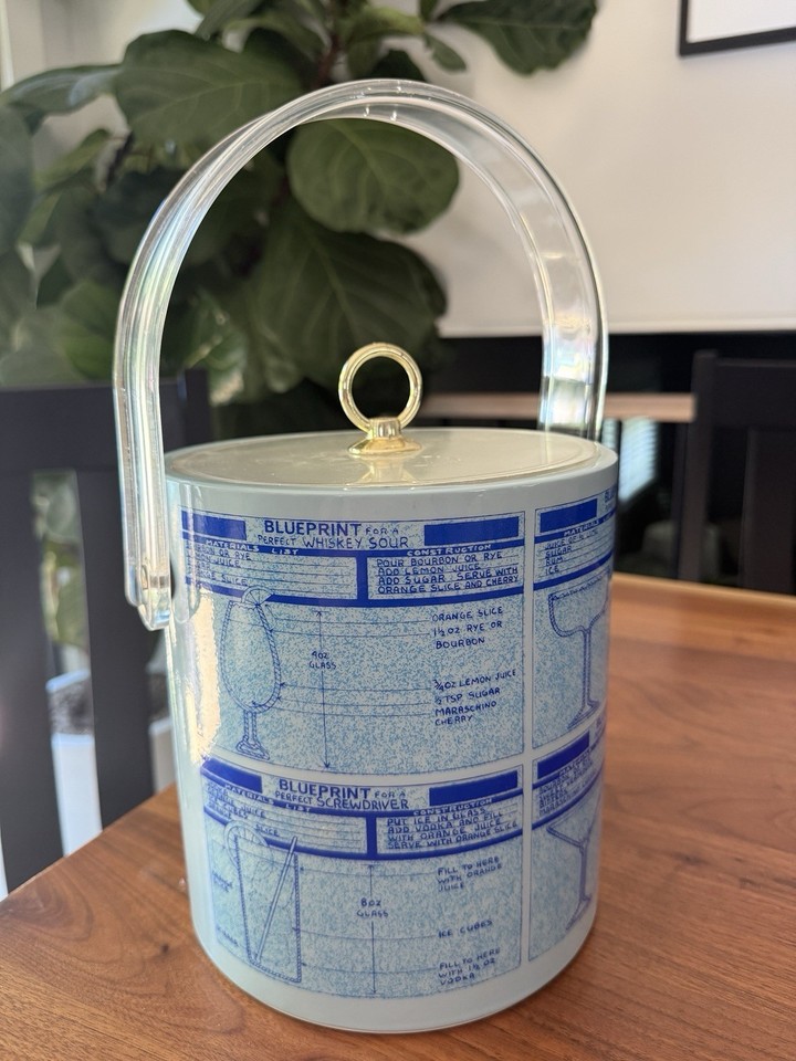 Blueprint-print ceramic ice bucket with cocktail instructions baked right in — functional, graphic, and mid-century cool in a way modern barware just can't replicate.