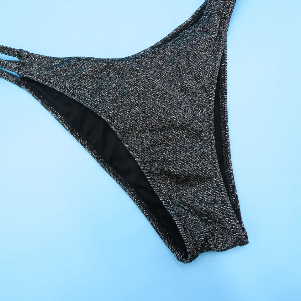 Parte inferior de bikini pequeña Victoria's Secret negra plateada brillante tanga de natación nueva Foto 2 de 4