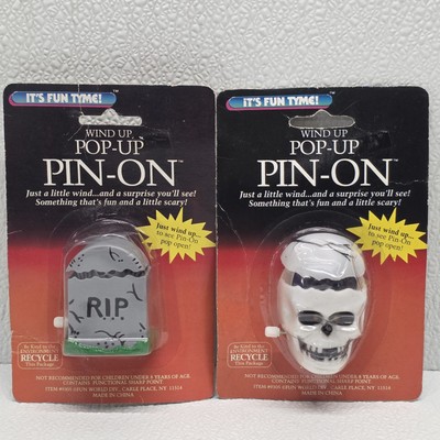 Vintage Set Of 2 Fun World Halloween Wind-Up Pop Up Pins - Skull & Gravestone 