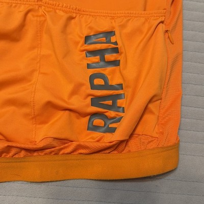 Rapha Pro Team Forcats de la Route Wind/Rain orange Jacket Womens
