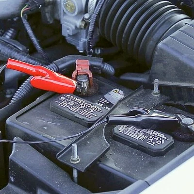 Alligator clamps on a 12v car battery