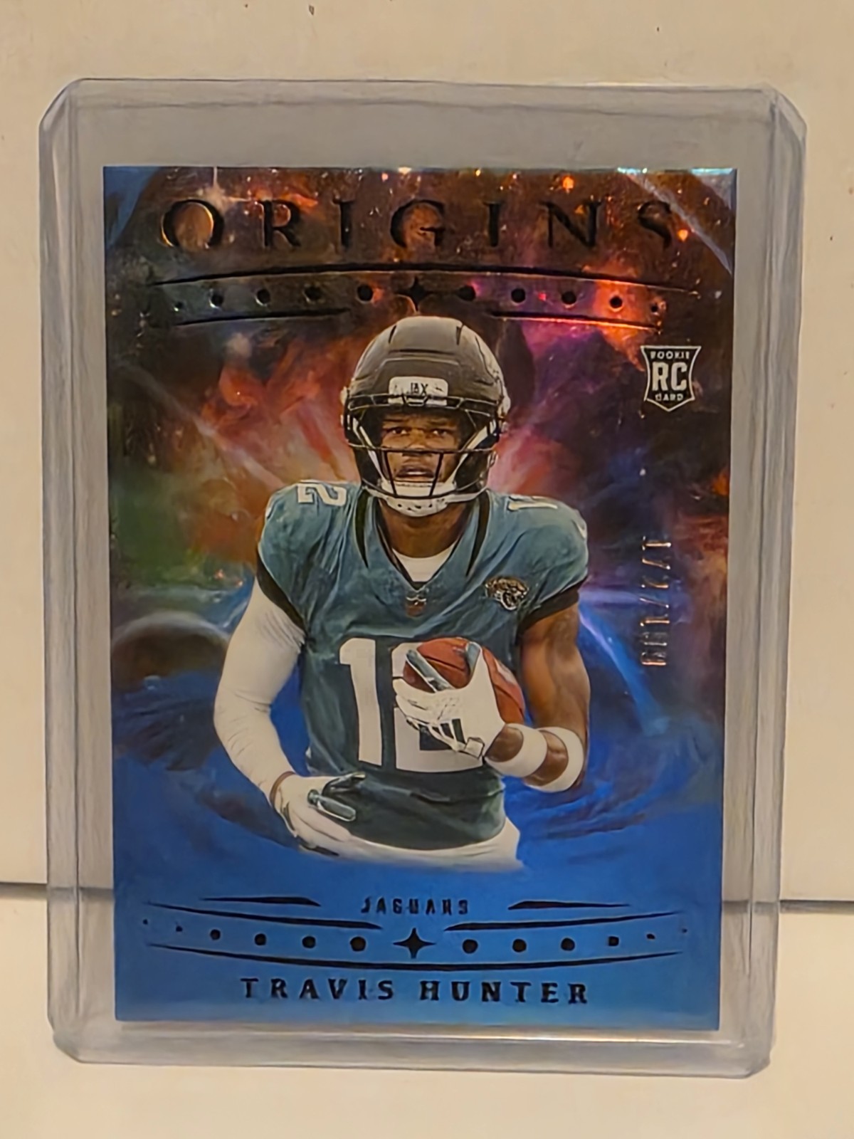 2025 Panini Origins Football Travis Hunter #142 RC Rookie Blue /199