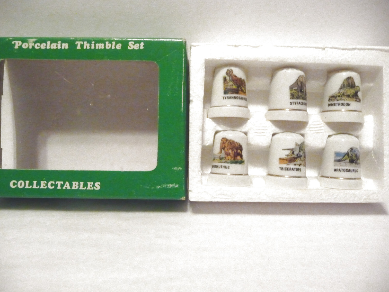 THIMBLE SET OF 6 VINTAGE PORCELAIN MSR IMPORTS 6 DINOSAURS IOB eBay