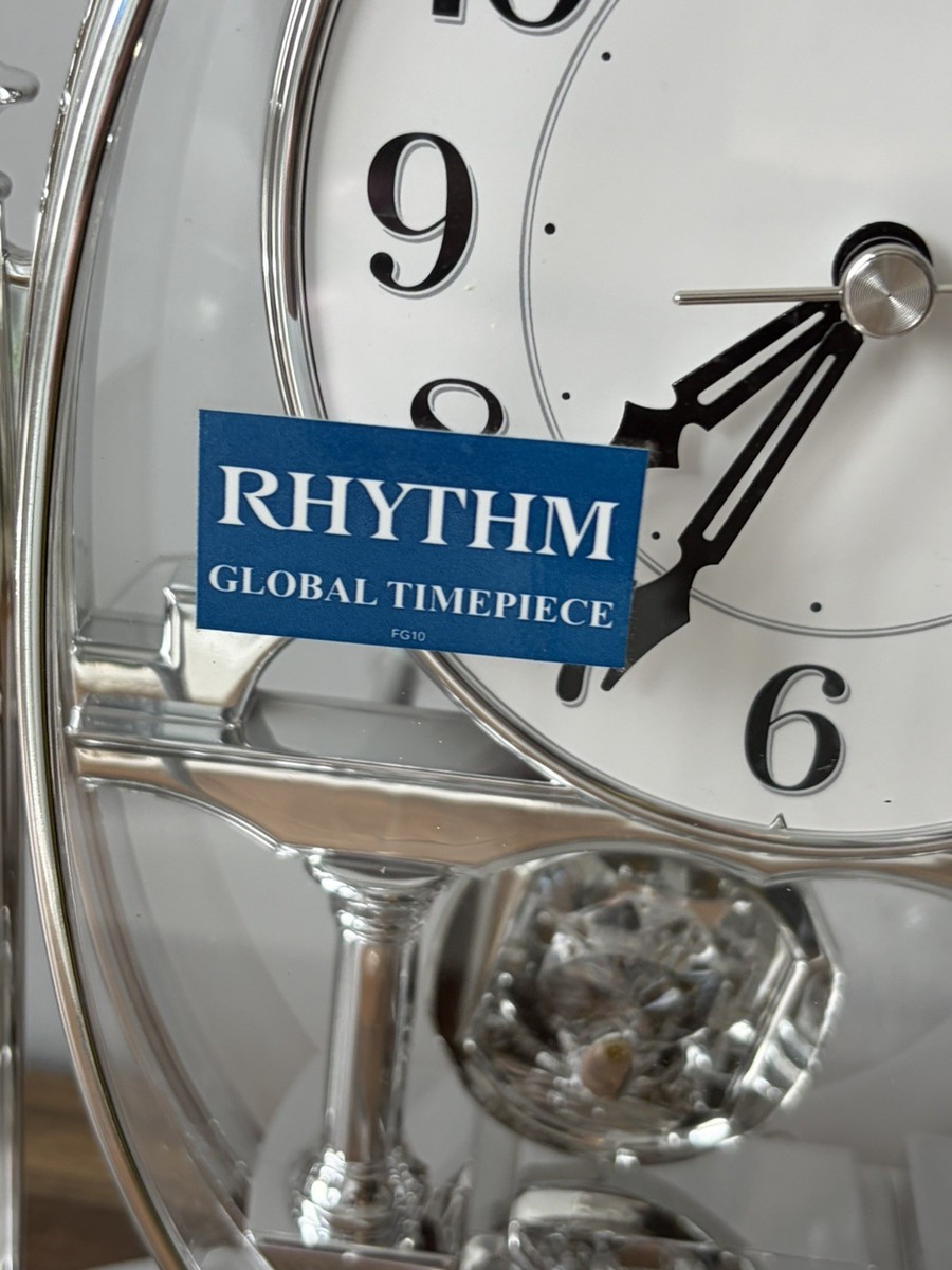 RHYTHM スワロフスキー装飾 置時計 Silver Rhythm Anniversary Mantel Clock Rotating Pendulum Swarovski