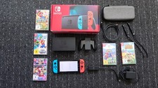 Nintendo Switch mit Schutzfolie, LAN Adapter …