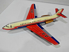 AMERICAN AIR LINES DC-9 JET LINER- FRICTION POWERED WORKS--ALL TIN- JAPAN