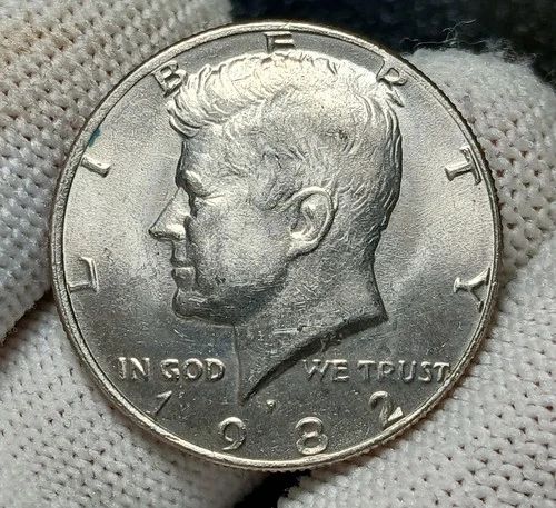 1982-P Kennedy Half Dollar In AU+/UNC Condition