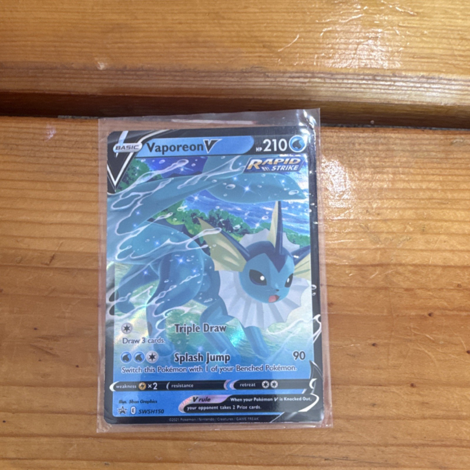 Pokémon TCG Vaporeon V SWSH150 Sword & Shield Promo Black Star Rapid Strike Holo