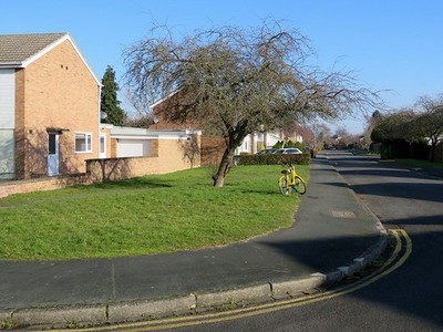 Photo 12x8 Along Almoners' Avenue Cherry Hinton A yellow hire bike awaits  c2018