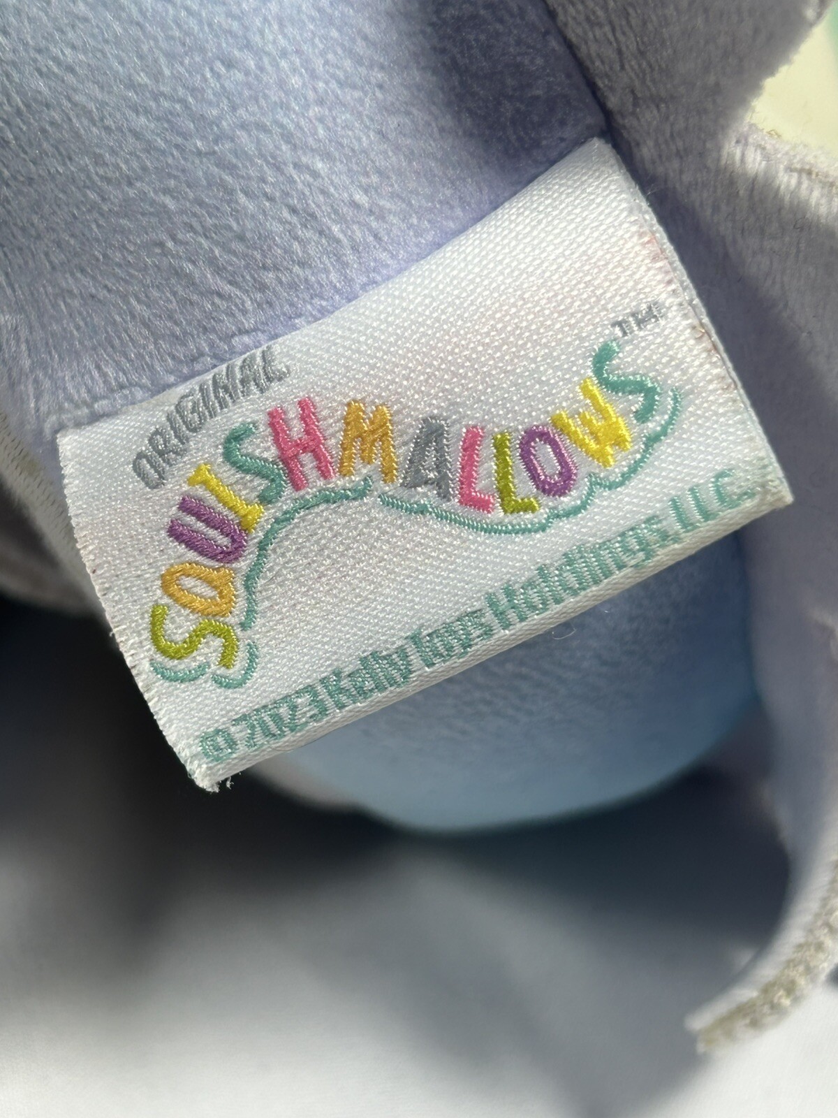 APL Squishmallows Pantofole di Peluche per Bambini Elodie il Polpo Arcobaleno M