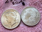 2 X   SILVER DOLLAR COINS.  UNC. +  LOT #  8 — photo 1