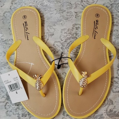 white line flip flops