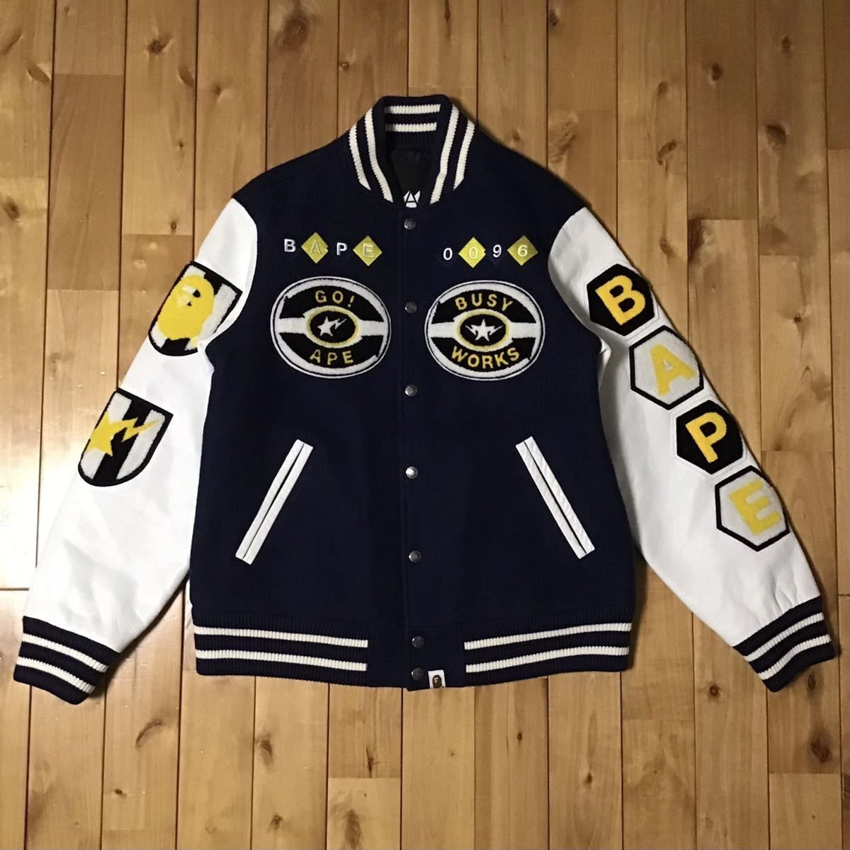 A BATHING APE (BAPE) Giacca varsity manica pelle BAPE LOGO taglia M Navy una pelle di scimmia da bagno 2503TY