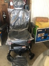 power wheel chair. Brand new 12 volt battery and charger 300 pd weight limit