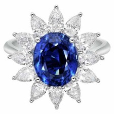 5.08 Carat Royal Blue Sapphire With 12 Brilliant Pear Cut 1.87CT CZ Cluster Ring