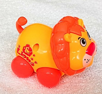 2025 Orange & Yellow Spring Wind-Up ROLLING LION Head & Tail Move When Travels