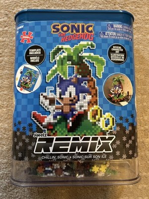 TOMY Jixelz Remix Sonic Island, 1250 Pezzi. Kit Creativo Per Costruire Sonic 30x40 Cm, Con Gancio E Supporto. Da 8 Anni. Gioco STEM Ufficiale.