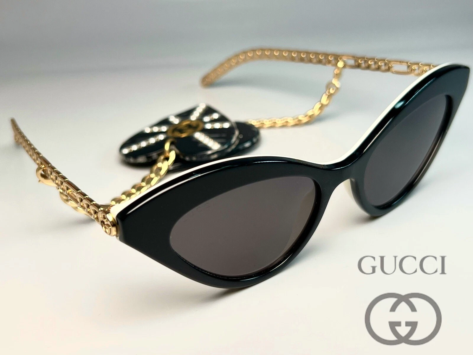 Nuovi occhiali da sole Gucci donna GG0978S occhio di gatto nero oro 52 140 catena cuore Italia