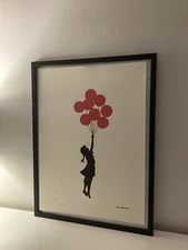 lithographie banksy avec certificat et encadrée 