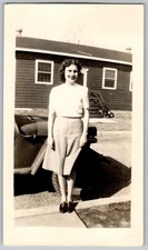 Vtg B W Snapshot Smiling Woman In White Blouse  Skirt By WW2 Barracks 1940s
