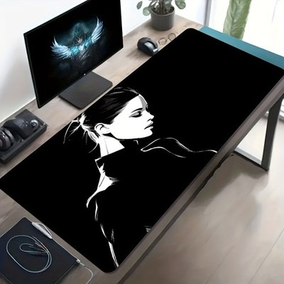A Large Gaming Mouse Pad Featuring a Black And White Artistic Illustration Desi