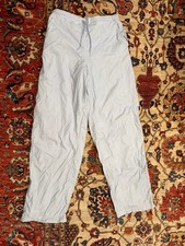 Nike Women  s Light Blue Nylon Track Pants Y2K Embroidered Logo Windbreaker Style