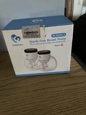 Brand new Bella baby hands-free breast pump color pink