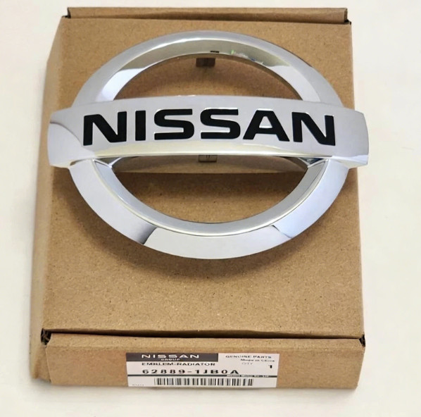 For 2015-2019 Nissan Versa Sedan 4Dr Front Grille Emblem 62889-1JB0A Silver NEW