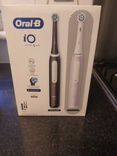 Brand New Oral-B iO Series 4 Electric Toothbrush Duo Pack Black ,pink