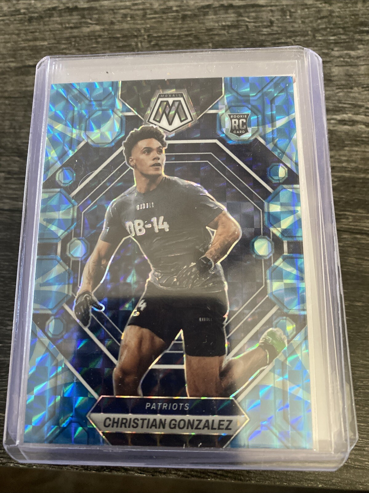 2023 Mosaic Football #300 Christian Gonzalez REACTIVE BLUE PRIZM RC - Patriots