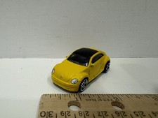 2012 Hot Wheels V5312 Volkswagen Beetle Yellow Diecast Car