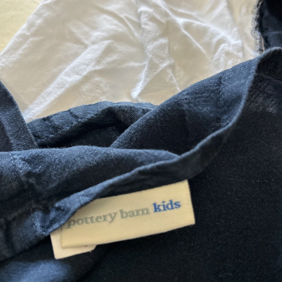 Sábana bajera y falda de cama azul liso Pottery Barn para cuna deportiva para niños Foto 3 de 4