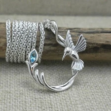 Sterling Silver Hummingbird Pendant with Blue Topaz by Keith Jack 18" Chain Box