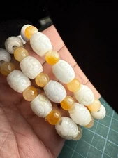 Women's Burmese jadeite carved bead bracelet, price per piece.