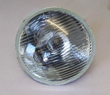 CLASSIC 7″ LUCAS STYLE H4/ HALOGEN HEADLAMP & BULB/ DOMED GLASS (RHD - W/ PILOT)