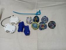 Lot of 6 Beyblades, 4 Launchers Used   Great Condition