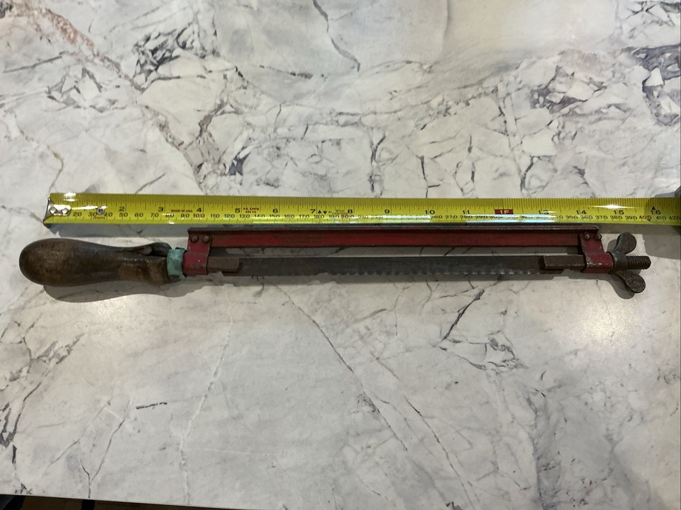 An early 20th-century British patented hacksaw with an unusual design that predates modern tool manufacturing — a proper conversation piece for the workshop wall.