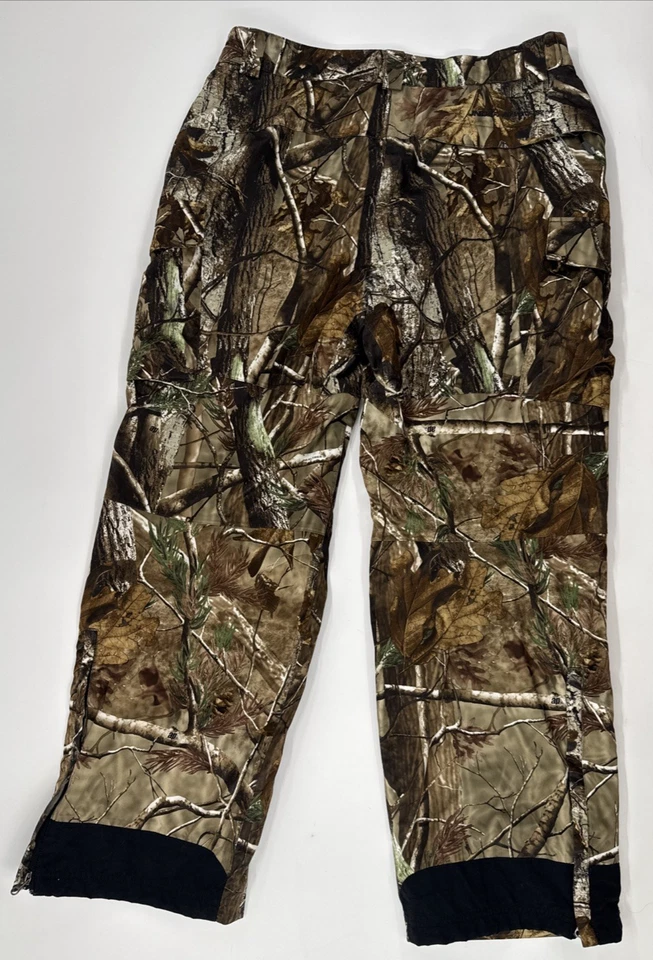 Pantalones de rendimiento Under Armour camuflados para hombre grandes forrados con cremallera tobillos reforzados rodillas Foto 2 de 4