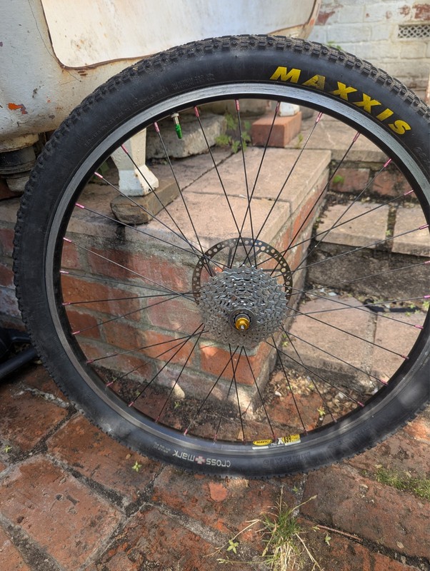 26" Hope rear wheel, with Mavic X139 rim, XT 9 speed cassette with tyre , brake 