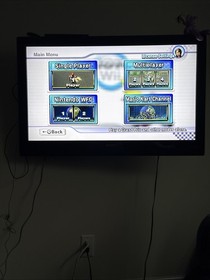 Wii Console With Mariokart And Mario Bros Wii