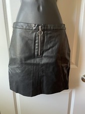 Bebe Black Faux Leather Mini Skirt Size 6 Circle Zip Front NEW WITH TAGS