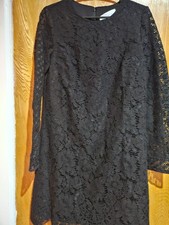 Elegant Club Monaco black lace shift dress with long sleeves. Soft lining and de