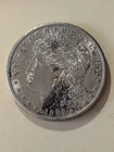 1887 S Morgan Silver Dollar, uncirculated San Francisco