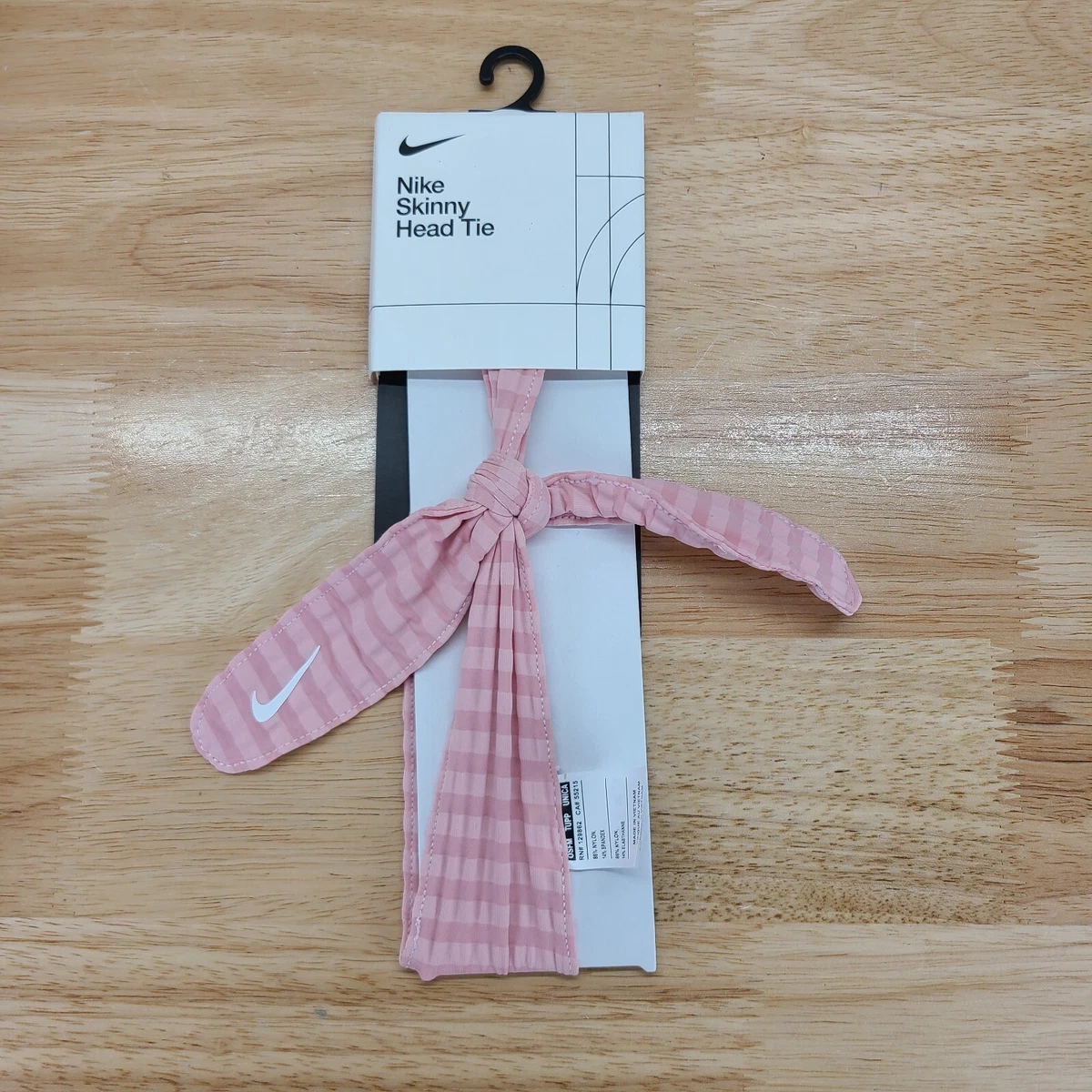 Nike skinny head tie top