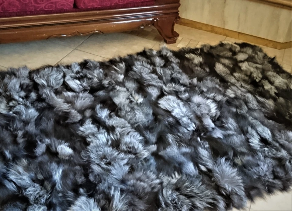 Risante tiro de piel de zorro, manta de piel Foto 2 de 4